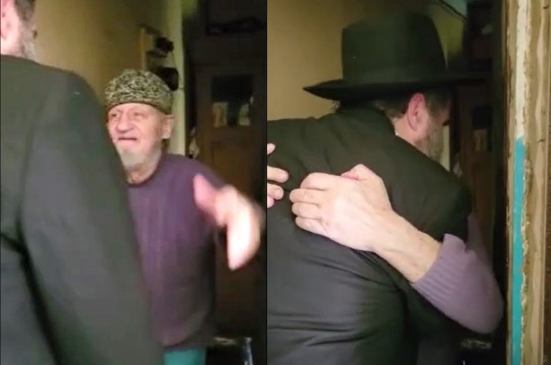 קשיש מאוקראינה מופתע לראות את השליח שחזר על מפתן הדלת