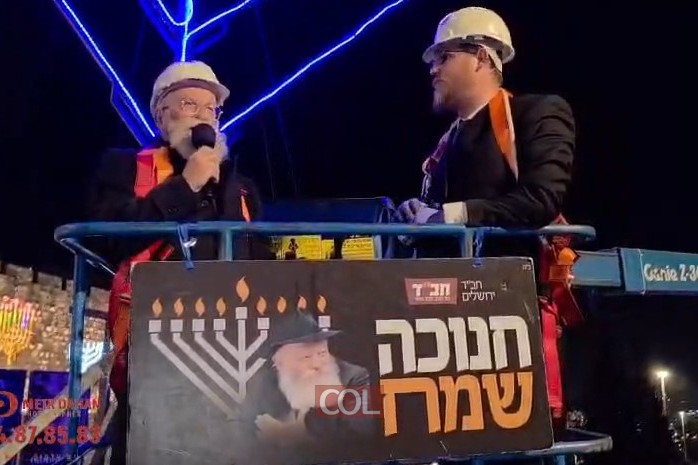 בפרסומי ניסא מול החומות, הודלק נר שביעי של חנוכה: בהשתתפות הרב נועם רוט והרב יעקב הלפרין, כובד בהדלקה הרב יעקב גלויברמן. צילום: מאיר דהן. צפו: