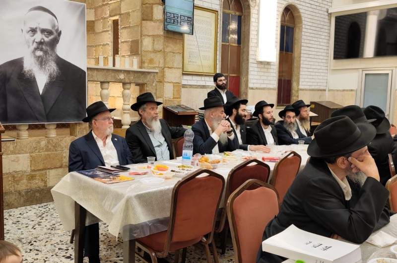 כ